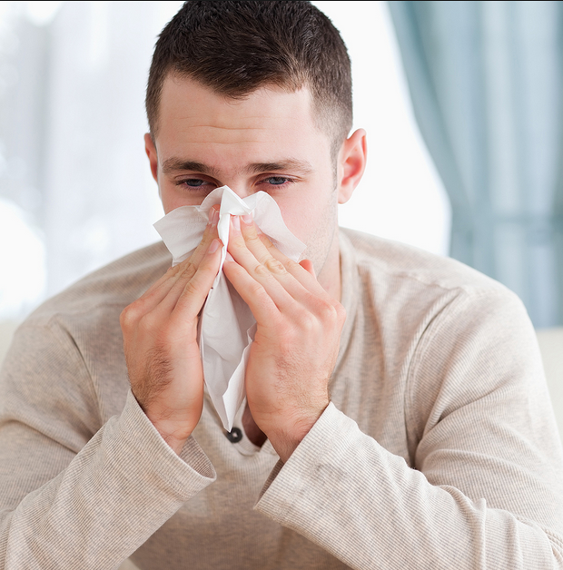 Common Cold Man blowing his nose